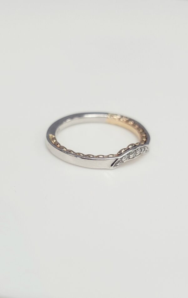 14kt White and Rose Gold .06ctw round Diamond Band, size 6.